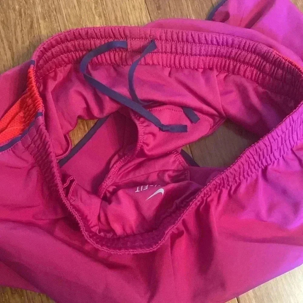Nike Dri-fit women’s running shorts - magenta/red- inside pocket - medium - Picture 3 of 5
